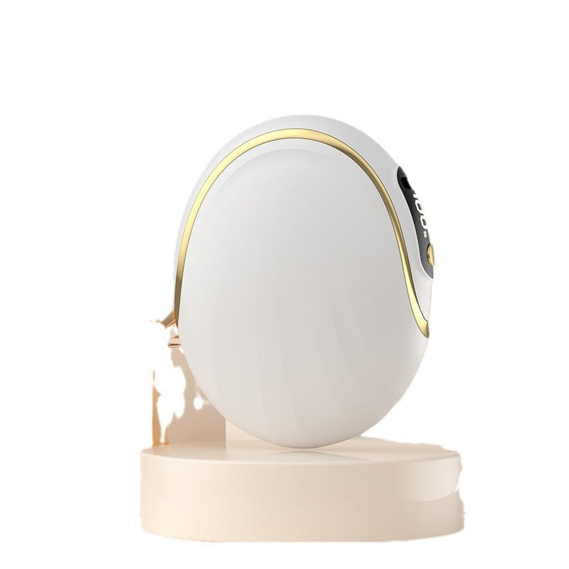 Pink egg shaped rechargeable hand warmer