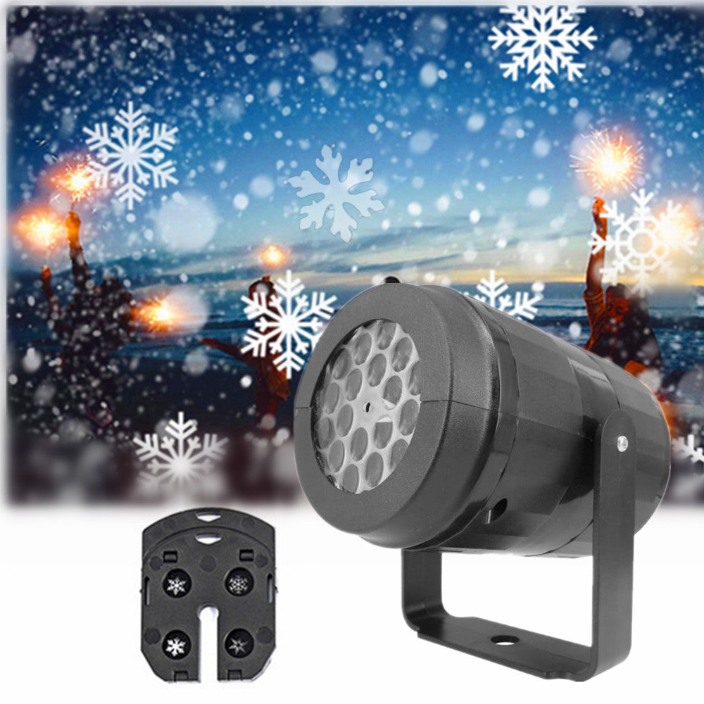 Snowflake projector lighting a house front
