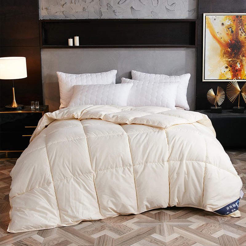 Quilted winter duvet on a bed