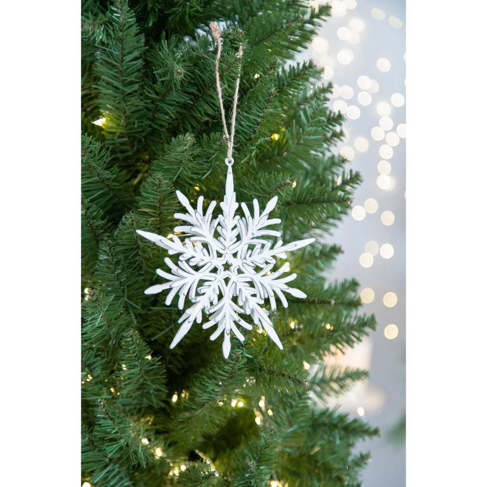 White metal snowflake hanging decorations with rope