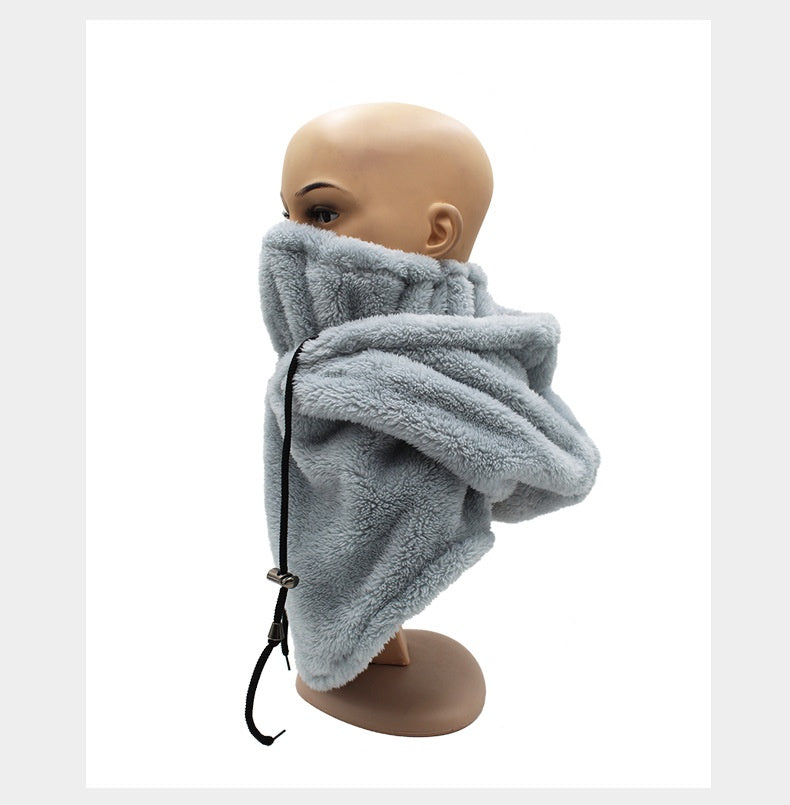 Woman wearing beige plush hood with scarf