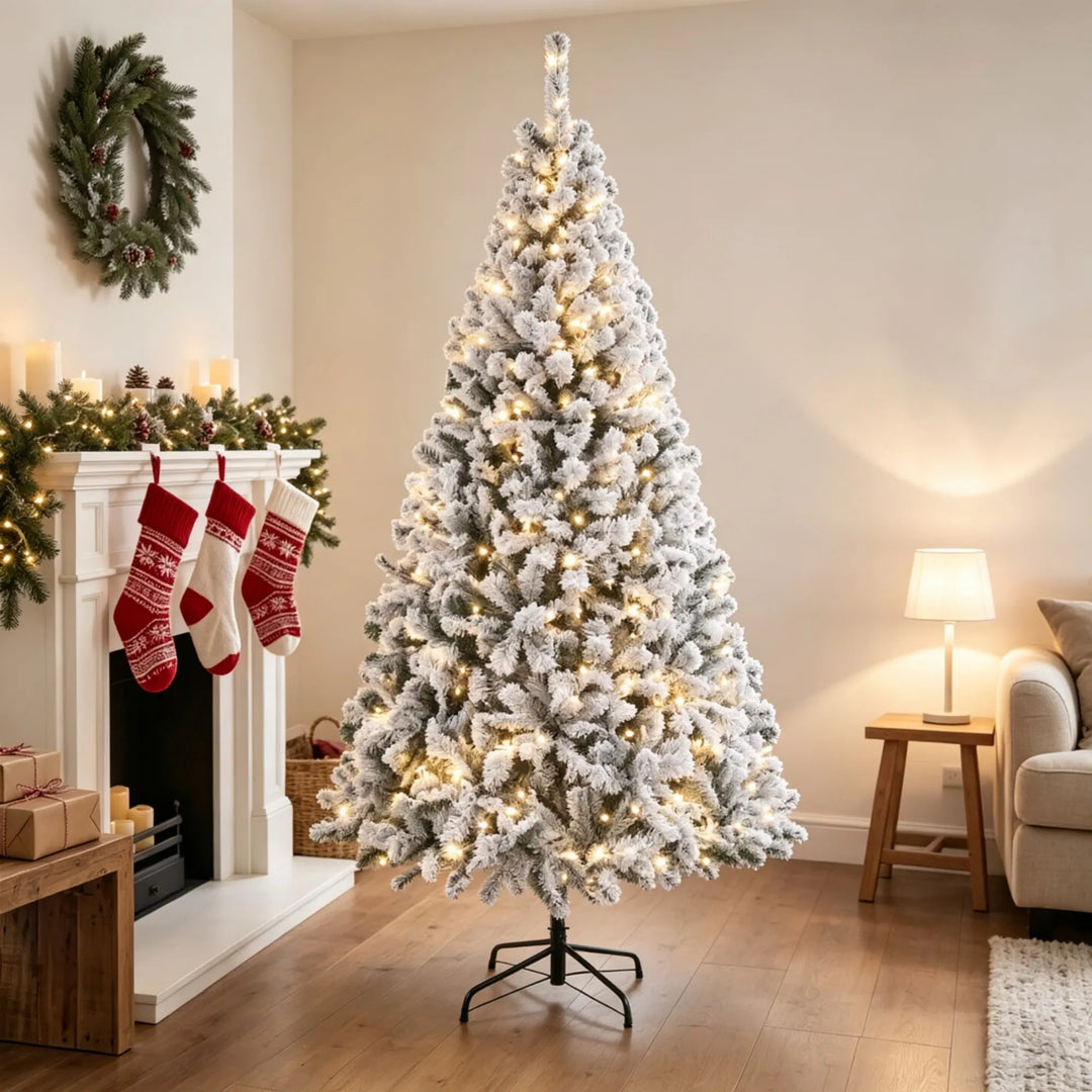 Tall flocked fir with warm lights