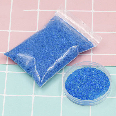 Coloured magic sand shaped underwater