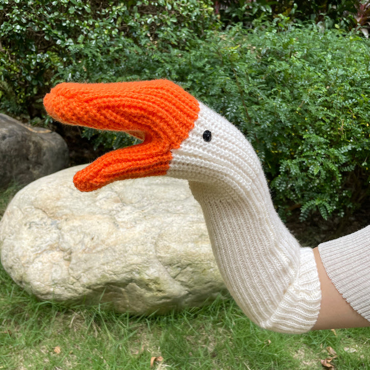 Knitted white goose head mittens