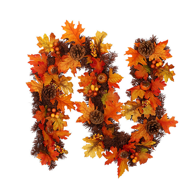 Autumn maple leaf garland on a mantel