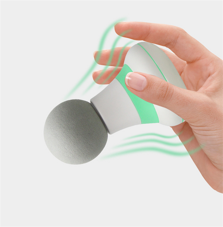 Mini pocket massage gun in hand