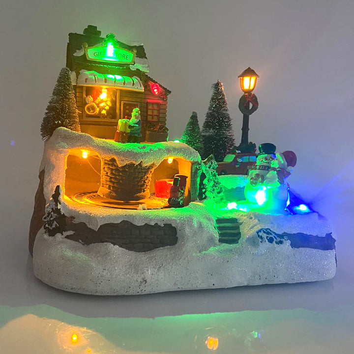 Light-up musical Christmas village house with rotating tree