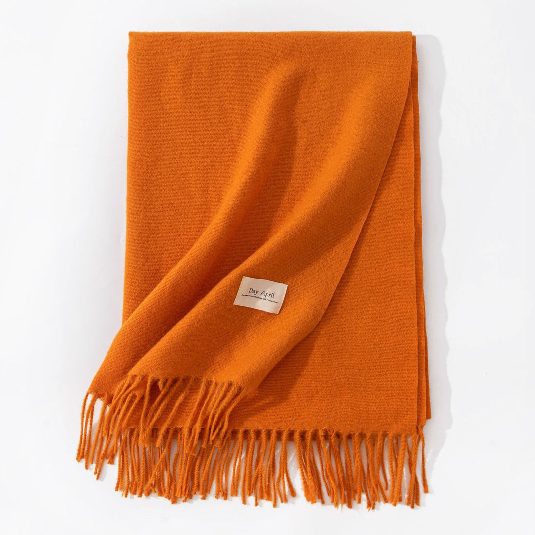 Woman wearing wide soft shawl scarf