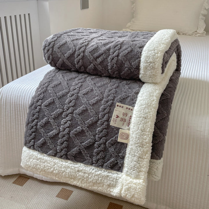 Cream cable knit blanket with sherpa border