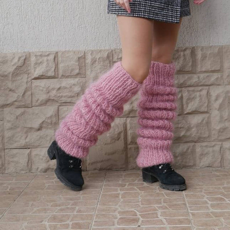 Chunky slouchy knitted leg warmers over boots