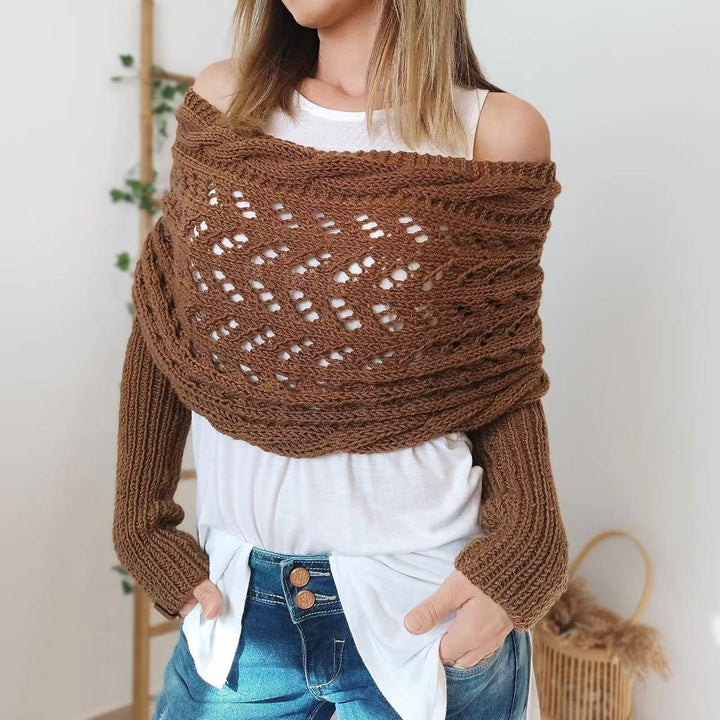 Woman in knitted shrug shawl with sleeves
