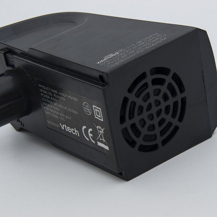 small white plug-in ceramic heater with digital display