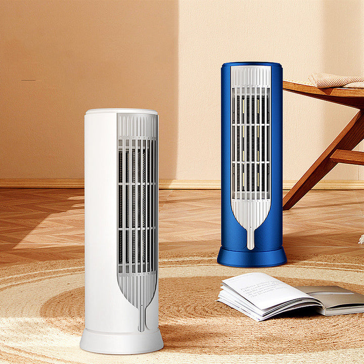 White compact tower fan heater on desk