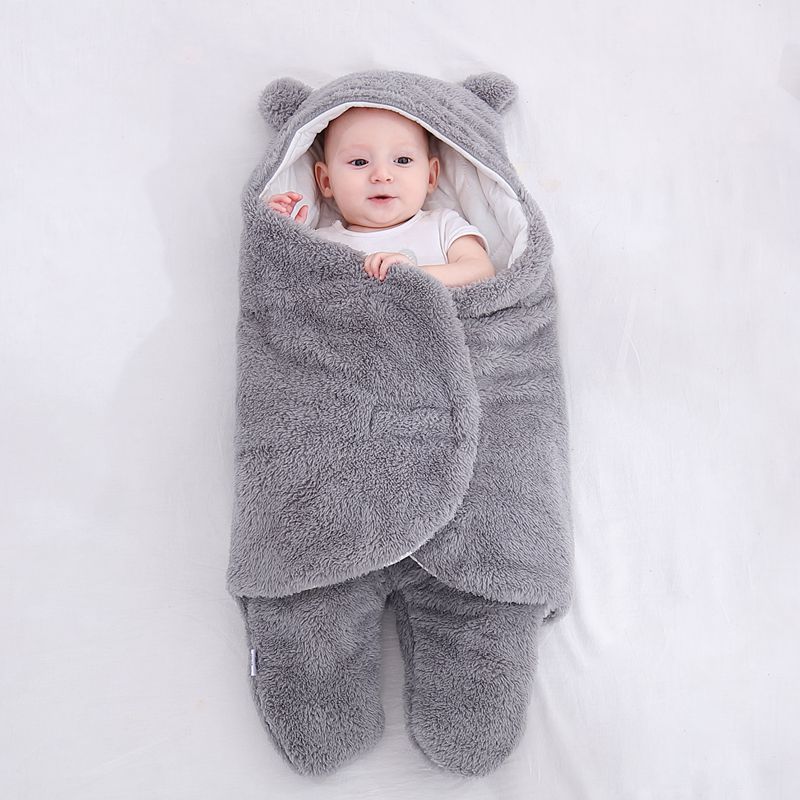 Baby in a teddy fleece sleeping bag