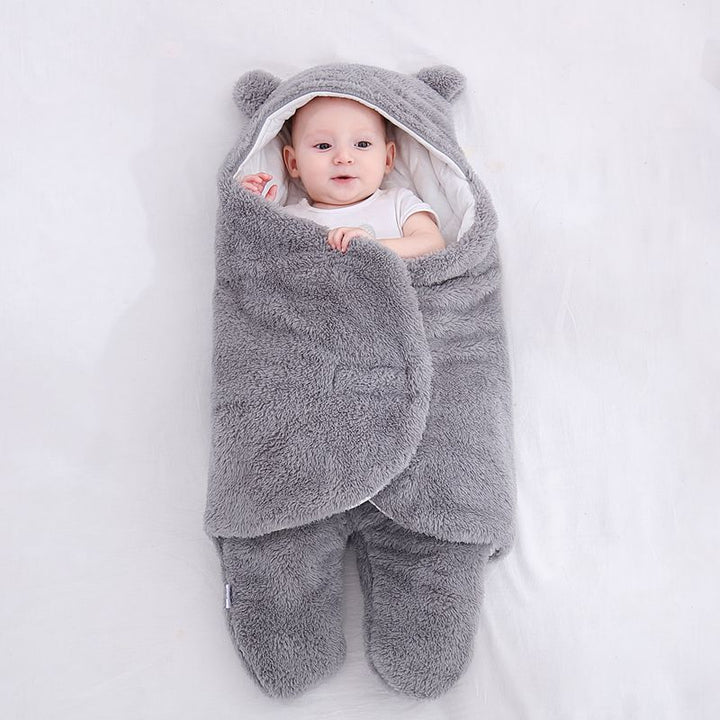 Baby in a teddy fleece sleeping bag