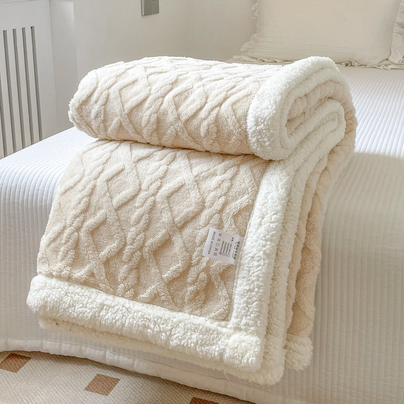 Cream cable knit blanket with sherpa border