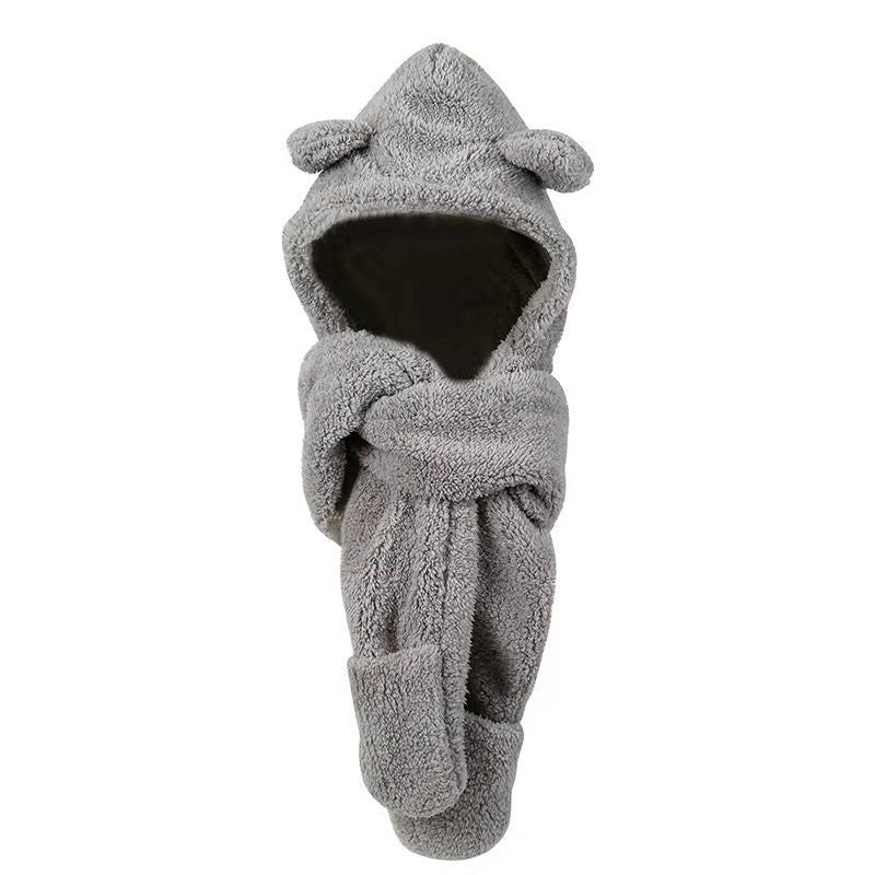 Woman wearing teddy hood scarf with bear ears