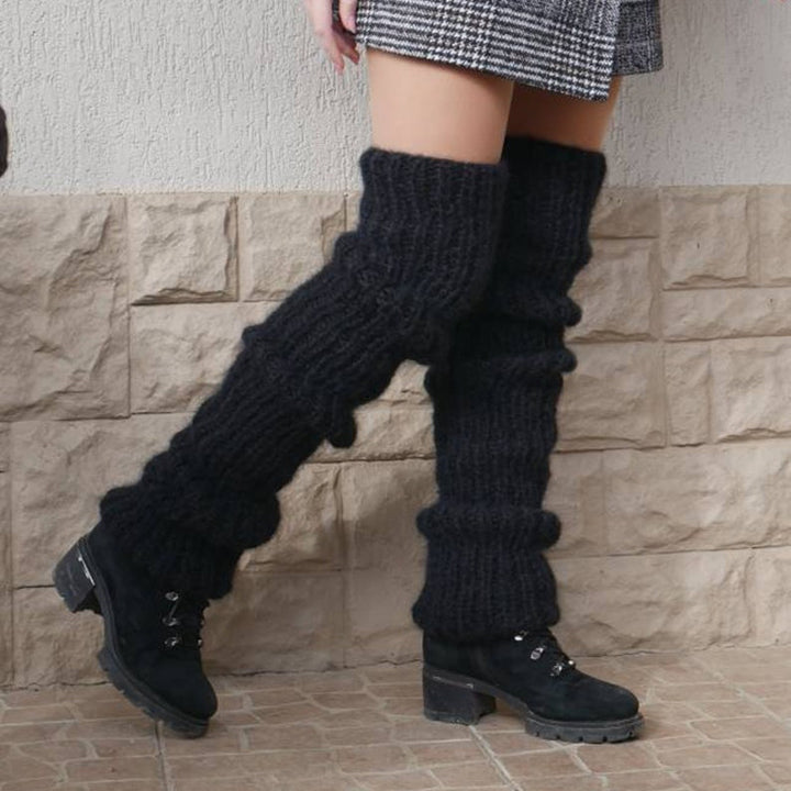 Chunky slouchy knitted leg warmers over boots