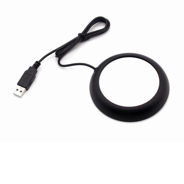 Wood-look USB coaster warming a coffee mug