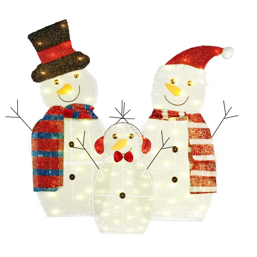 Three plush light-up snowman figures