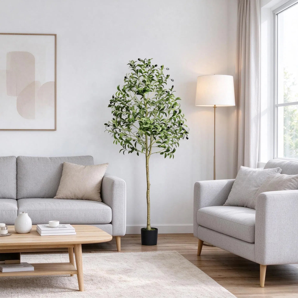 Tall artificial olive tree in black pot