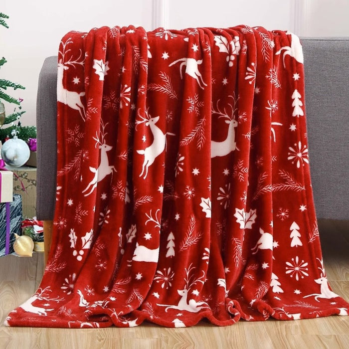 Heat Hollow Christmas flannel throw with festive prints