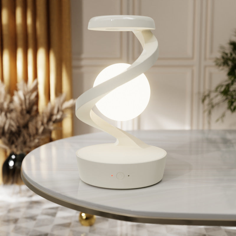 Floating moon lamp in spiral frame