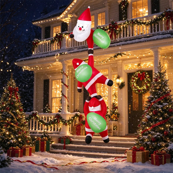 Three inflatable Santas climbing
