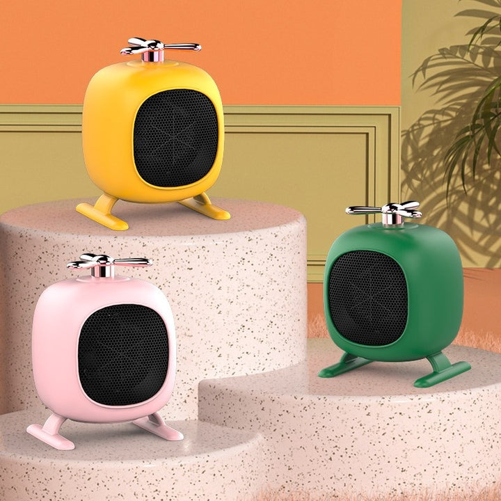 Yellow helicopter-shaped mini fan heater