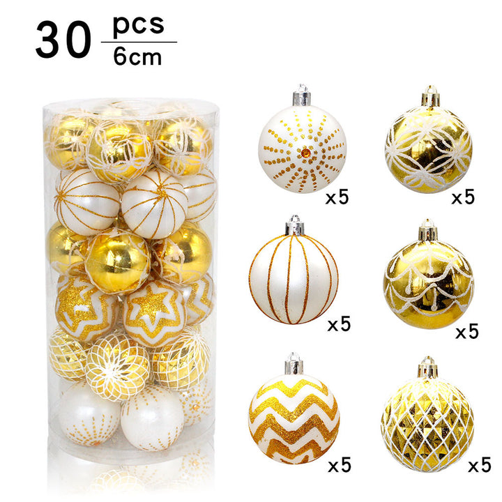 30 gold and white hand-painted Christmas baubles in a tub
