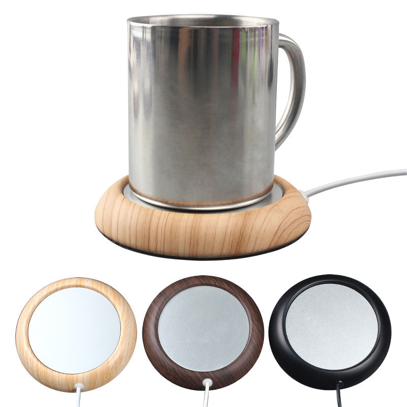 Wood-look USB coaster warming a coffee mug