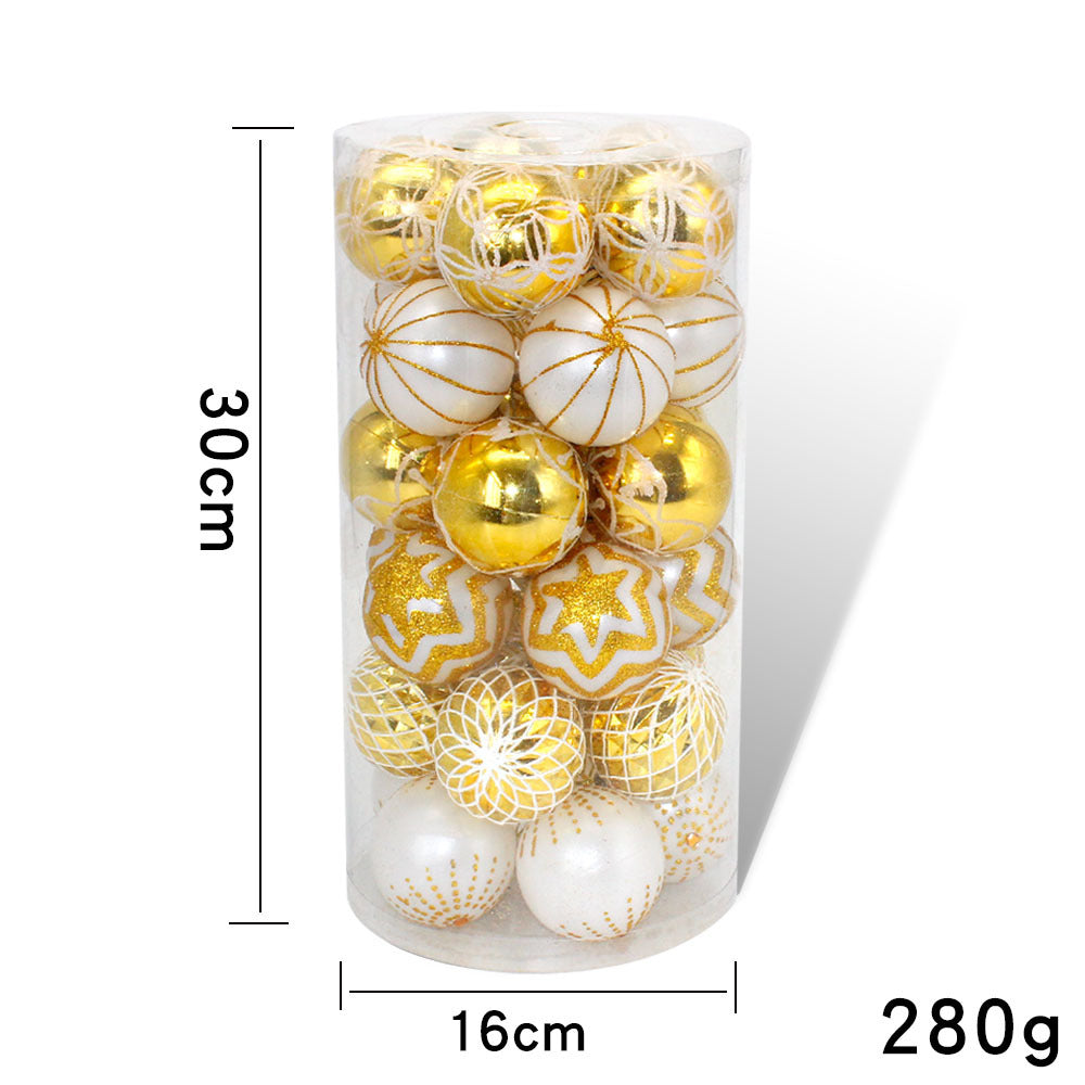 30 gold and white hand-painted Christmas baubles in a tub