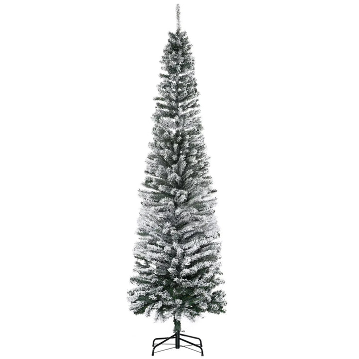 Tall slim snow-flocked tree, unlit