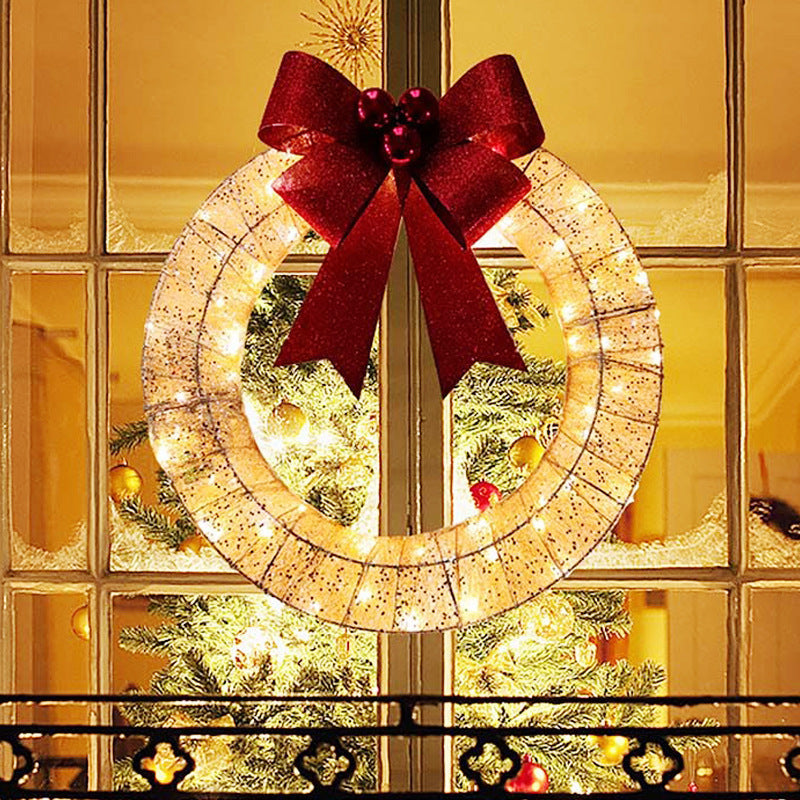 50 cm light-up Christmas wreath with 140 LEDs and big bow
