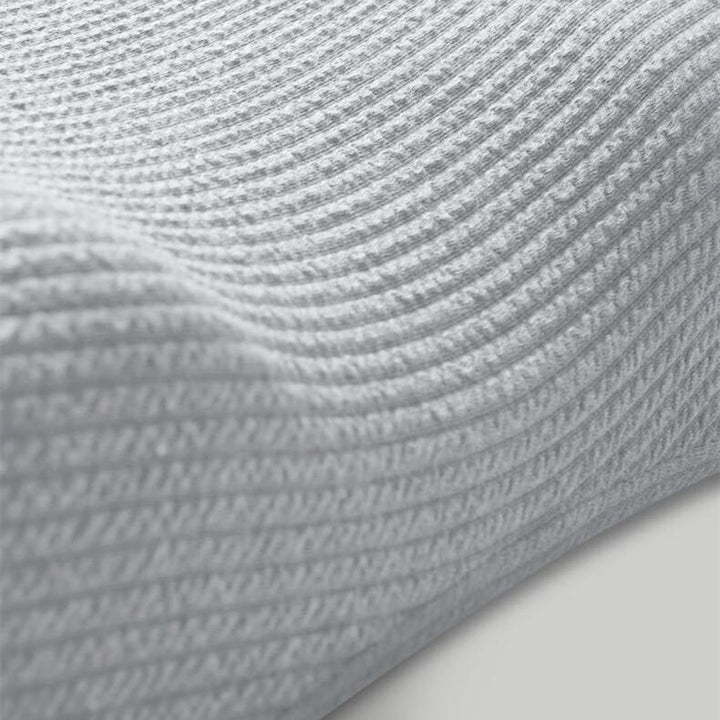 Grey memory foam pillow with knitted cover