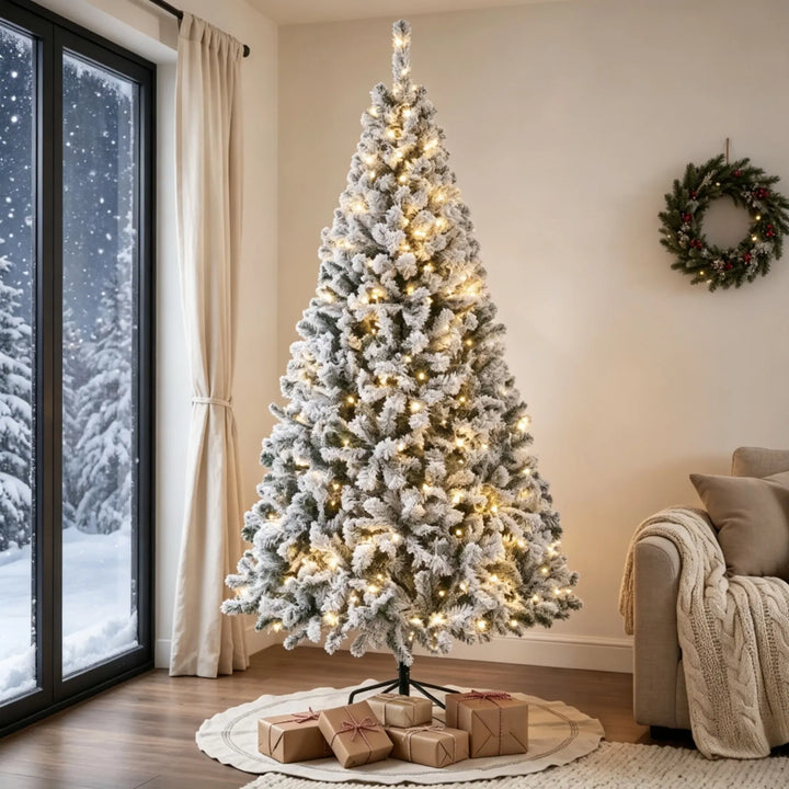 Tall flocked fir with warm lights