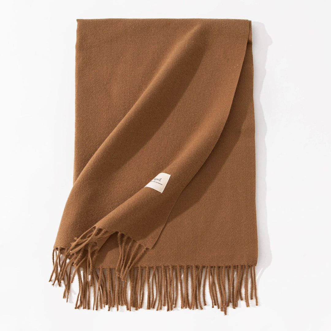 Woman wearing wide soft shawl scarf