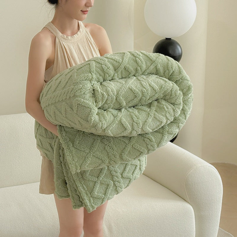 Green tufted velvet throw on sofa
