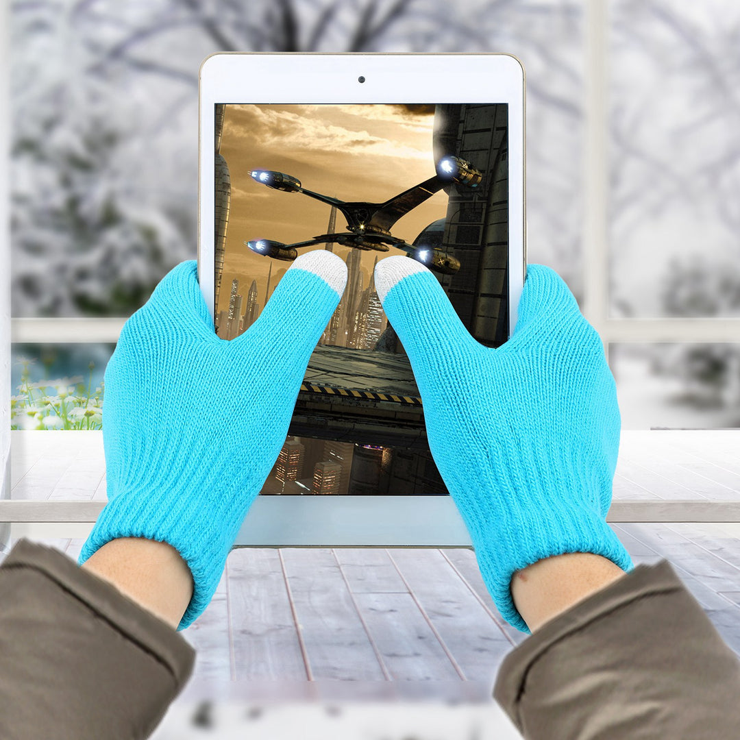 Grey knitted touchscreen gloves using phone