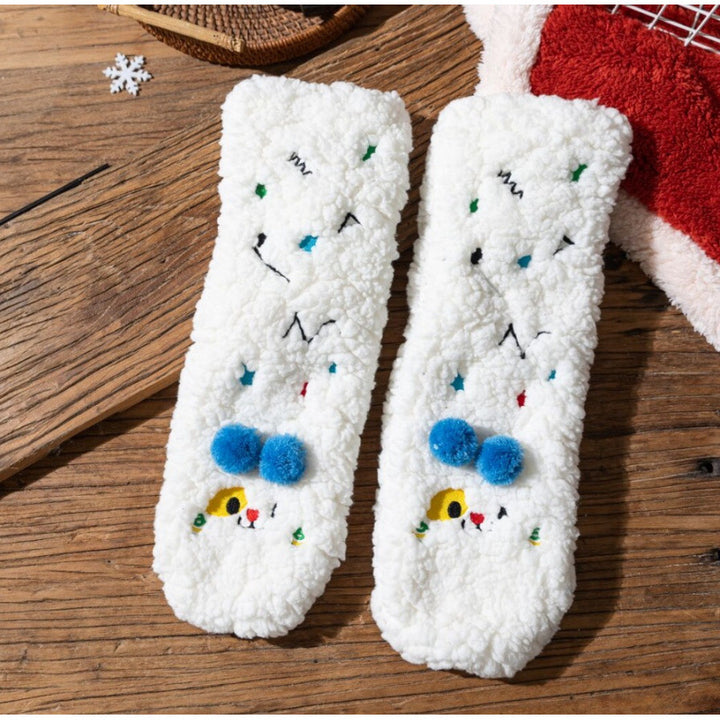 Fluffy yellow socks with embroidered face and pompoms