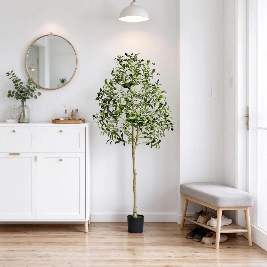 Tall artificial olive tree in black pot