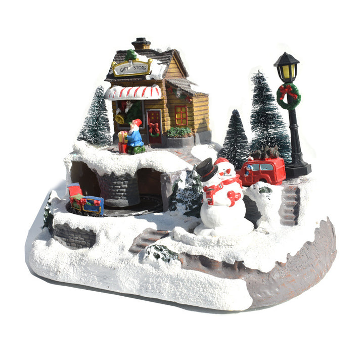 Light-up musical Christmas village house with rotating tree