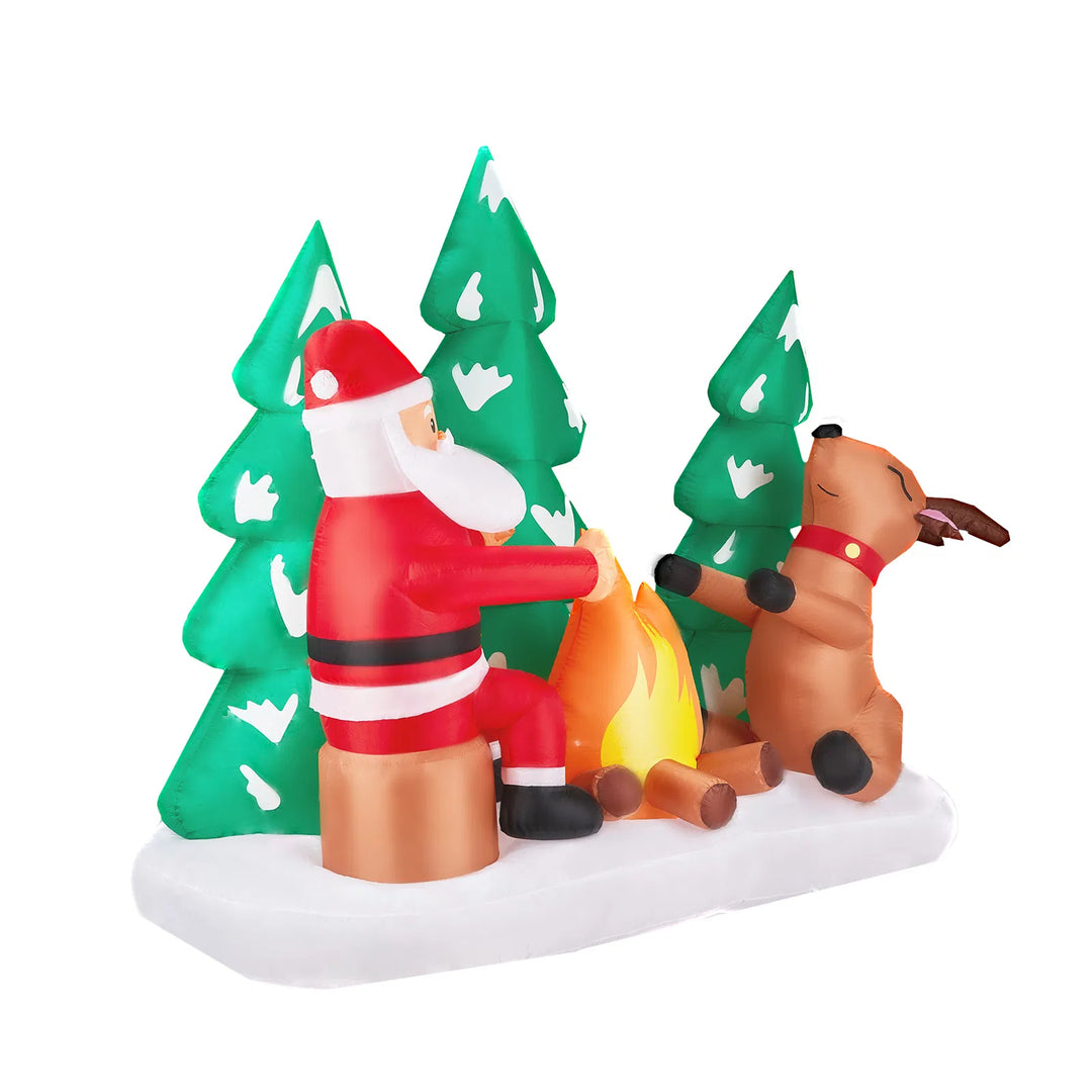 Inflatable Santa and reindeer around campfire