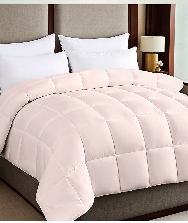 Pink box-stitched duvet on bed