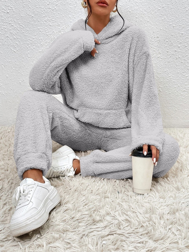 Woman in fluffy teddy hoodie and trousers