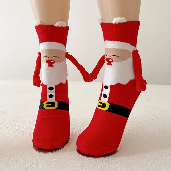 Christmas socks with magnetic hands linked