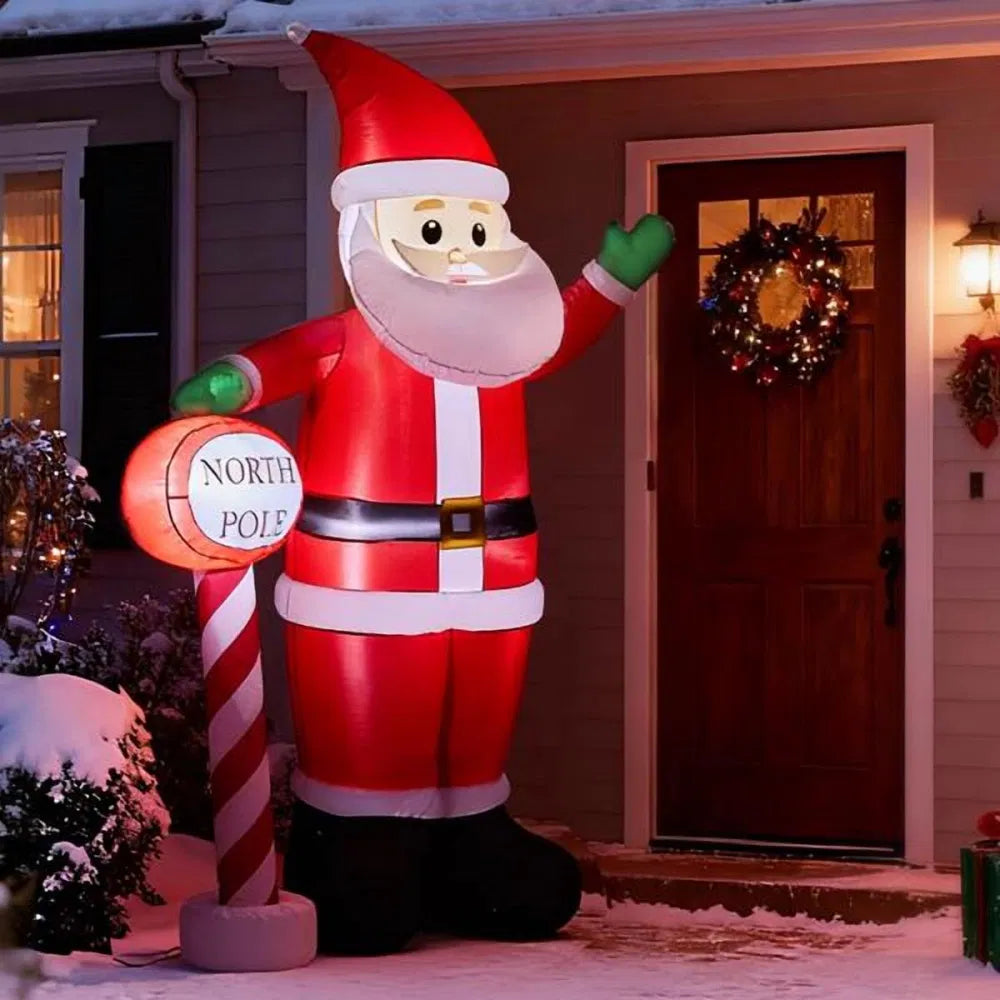 Giant inflatable Santa by North Pole sign