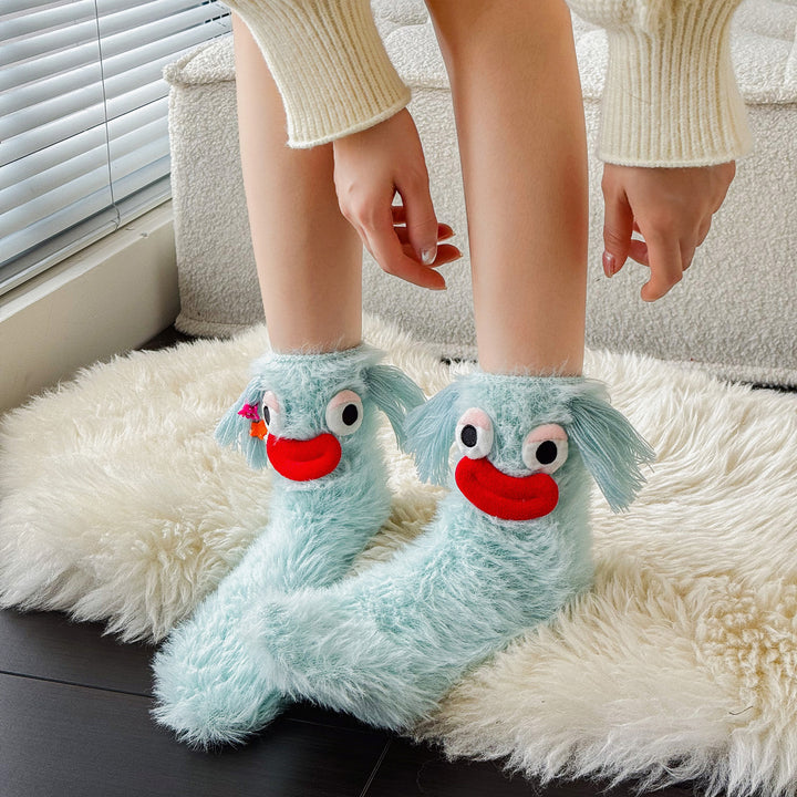 Fluffy socks with googly-eyed monster faces