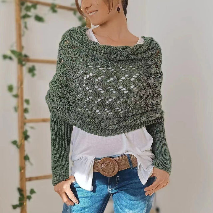 Woman in knitted shrug shawl with sleeves
