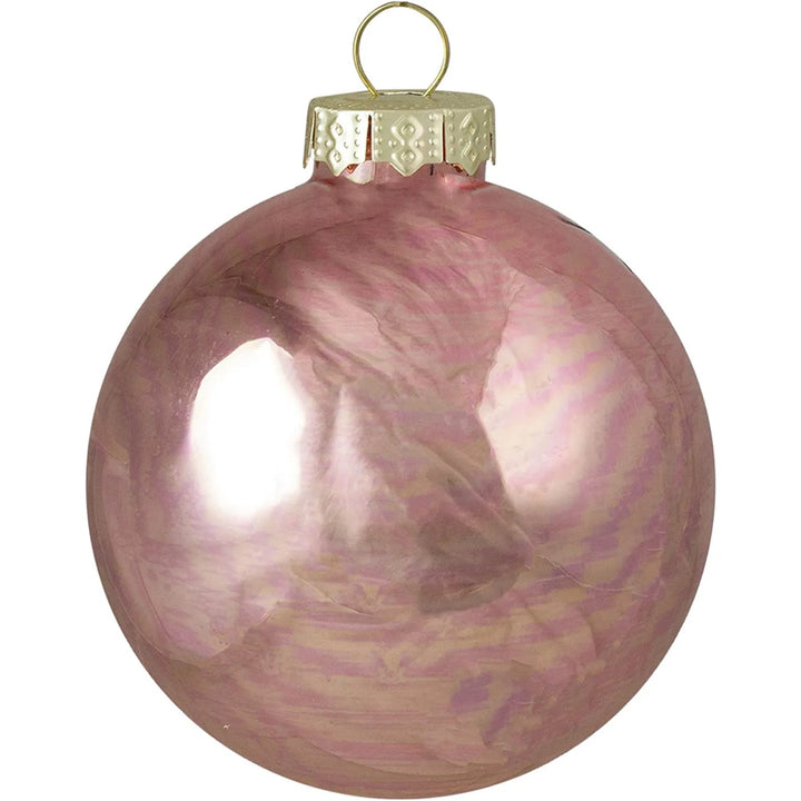 Nine pink glass Christmas baubles with gold caps